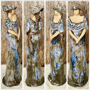 Skagens Dame i keramik - Lys hud - Kjole og hat i m�rk med bl� effekter.